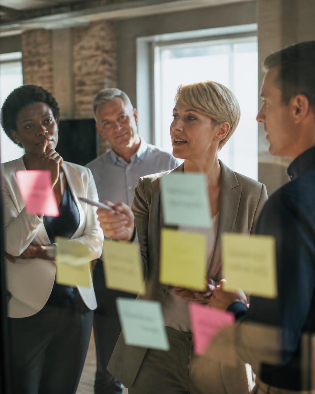 A leadership team working through a strategy session